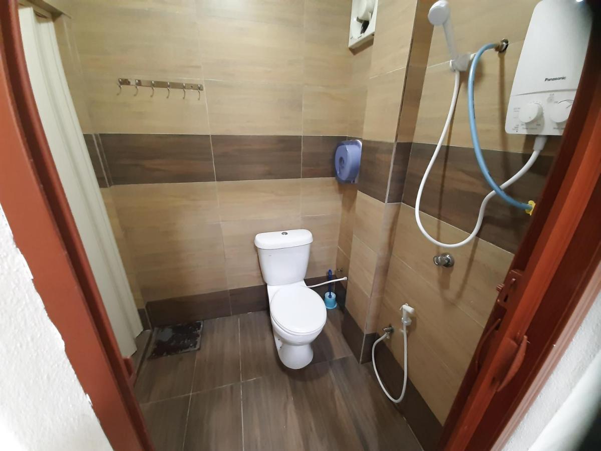 Mn Ferringhi Inn Batu Feringgi Buitenkant foto