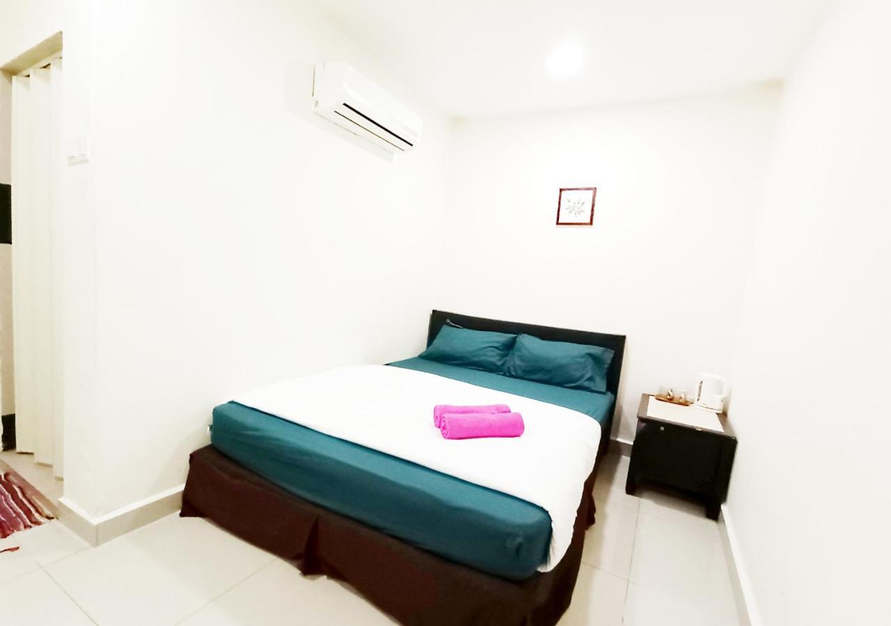Mn Ferringhi Inn Batu Feringgi Buitenkant foto
