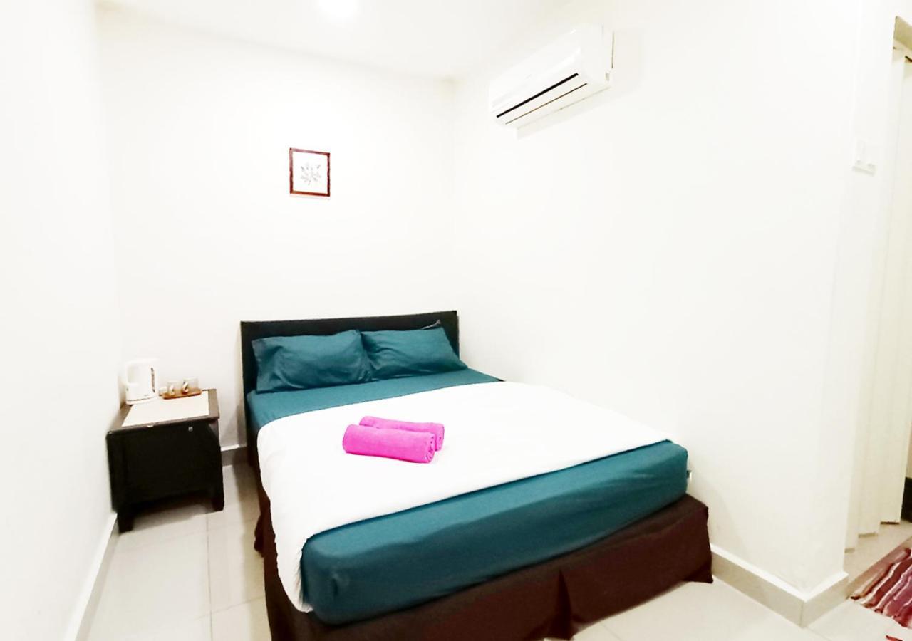 Mn Ferringhi Inn Batu Feringgi Buitenkant foto